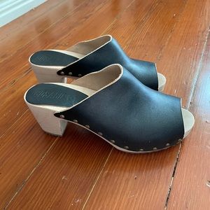 black leather peep toe clogs